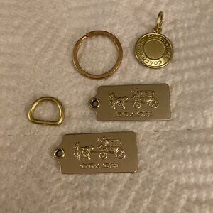 GOLD COACH CHARMS